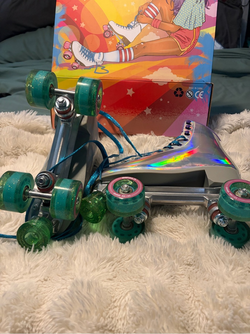 Impala Holographic SilverRoller Skates with Blue Glitter Wheels